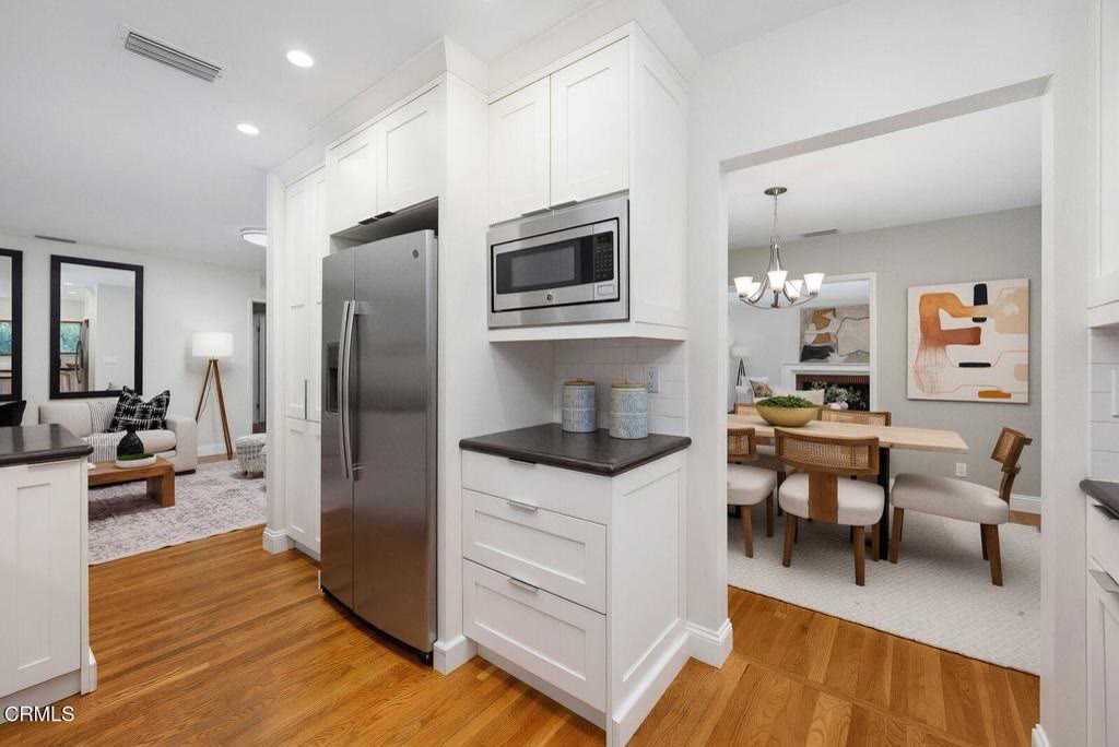 Kitchen with GE Profile appliances and gas range